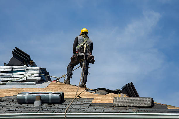 Professional Roof Replacement technician working in Freedom, NH